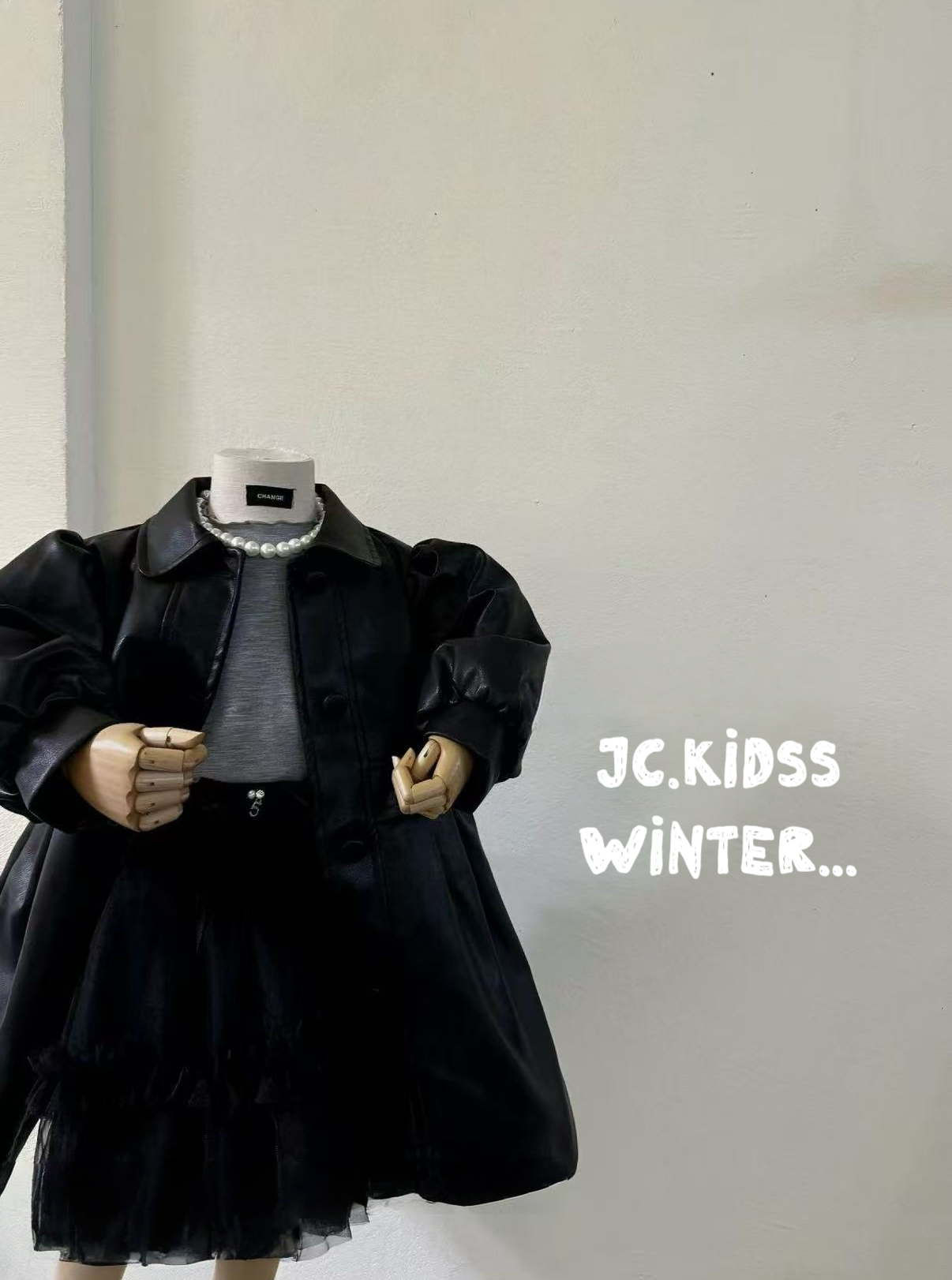 YKJK537 型格中長彷皮褸